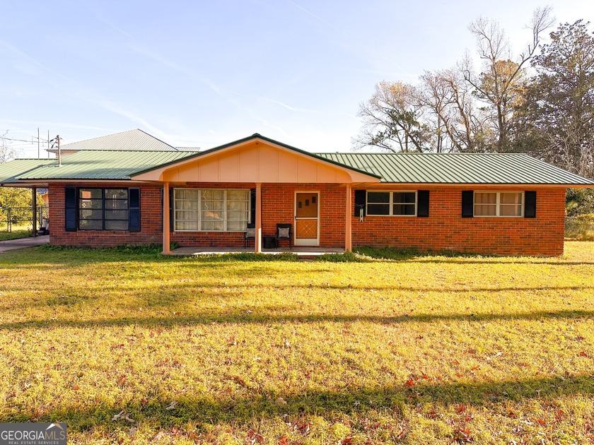 Welcome to this 3-bedroom, 2-bath four-sided brick ranch home - Beach Home for sale in Brunswick, Georgia on Beachhouse.com