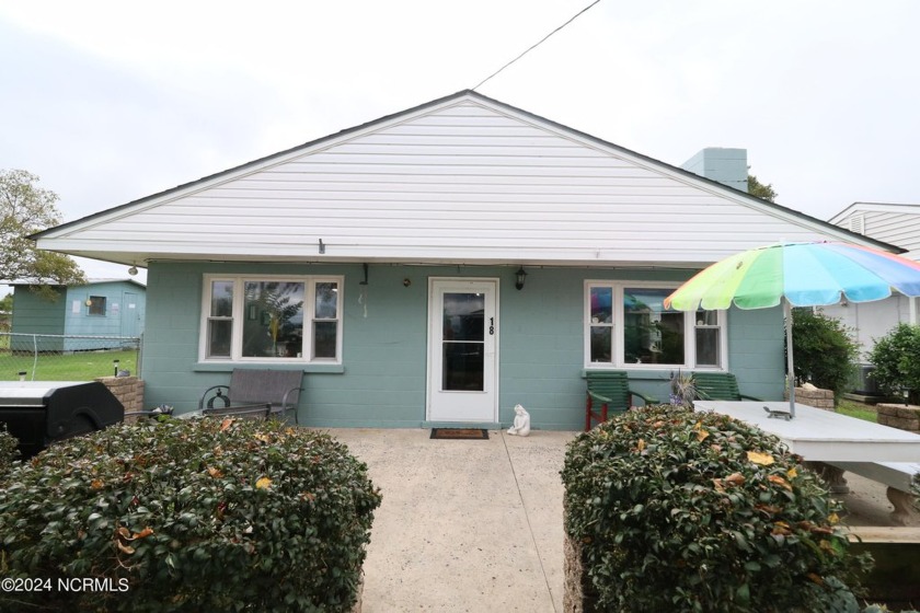 Discover this charming 4-bedroom, 3-bath single-story home - Beach Home for sale in Roper, North Carolina on Beachhouse.com