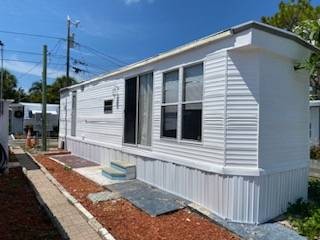 LIVE IN PARADISE! WALKING DISTANCE TO THE LOCALS FAVORITE - Beach Home for sale in Largo, Florida on Beachhouse.com