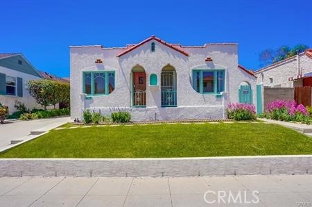 Opportunity awaits in this charming Spanish-style duplex nestled - Beach Home for sale in San Pedro, California on Beachhouse.com