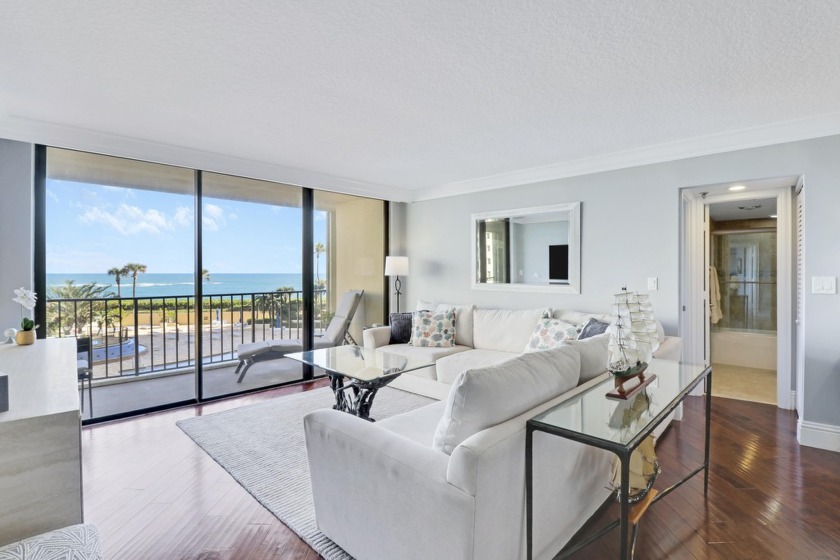 Indulge in coastal luxury with this pristine 2 bed, 2 bath Ocean - Beach Condo for sale in Jupiter, Florida on Beachhouse.com