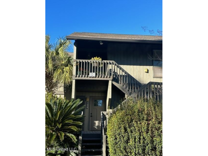 Take a look this cozy, upstairs unit that is overlooking one of - Beach Condo for sale in Diamondhead, Mississippi on Beachhouse.com