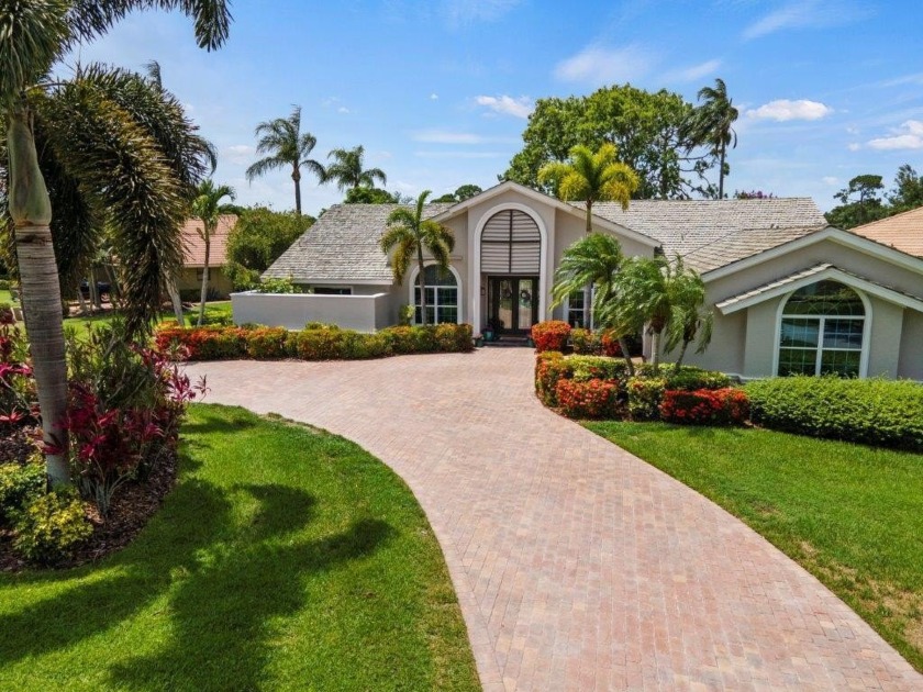 Waterfront...custom CBS home in Country Club Estates! Premier - Beach Home for sale in Port Saint Lucie, Florida on Beachhouse.com