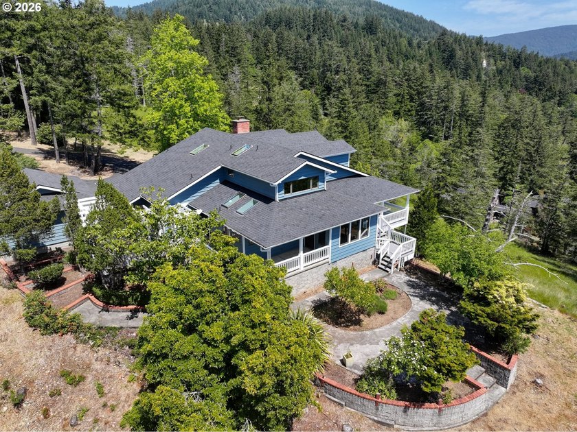 Stunning Mountain Views, Thoughtful Updates & Room to - Beach Home for sale in Gold Beach, Oregon on Beachhouse.com