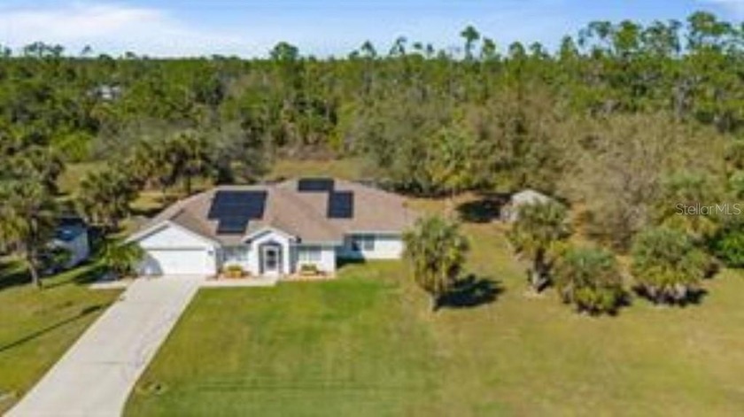Spacious 1-Acre Pool Home on Greenbelt -- Privacy, Flexibility & - Beach Home for sale in North Port, Florida on Beachhouse.com