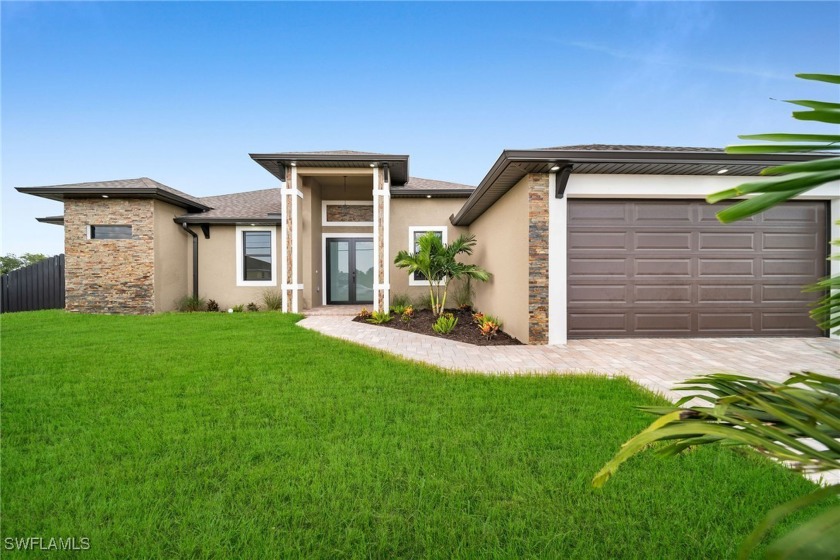 NO FLOOD ZONE !!!! THIS BEAUTIFUL NEW CONSTRUCTION HOME offers - Beach Home for sale in Cape Coral, Florida on Beachhouse.com