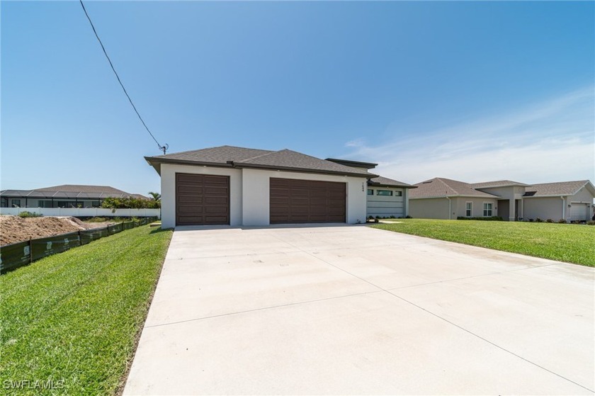 Newer home. 3 beds, 3.5 baths, and a 3-car garage. High 12' flat - Beach Home for sale in Cape Coral, Florida on Beachhouse.com