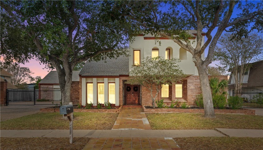 Experience elegant living in this spacious 4-bedroom, 4-bath - Beach Home for sale in Corpus Christi, Texas on Beachhouse.com