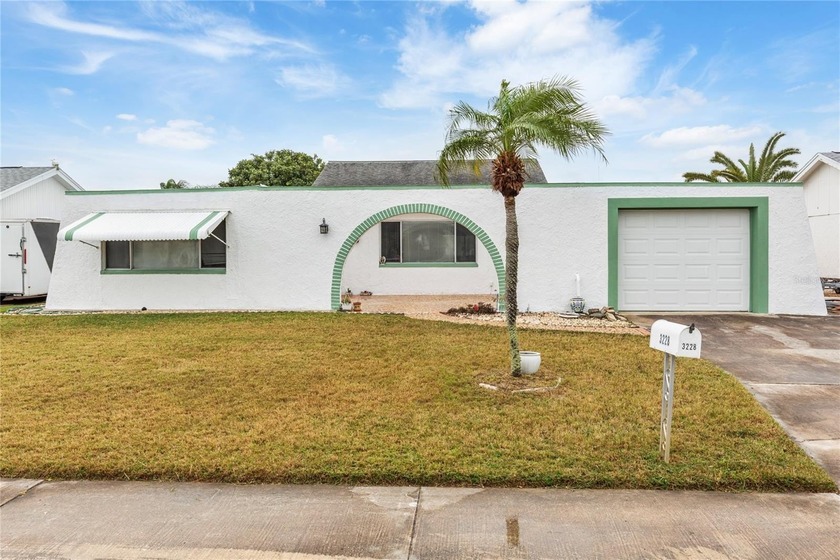 Welcome to this charming two bedroom, two bath home with a - Beach Home for sale in Holiday, Florida on Beachhouse.com
