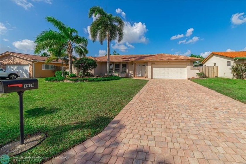 Incredible Opportunity to own your Own 4 Bedroom 2 Bath with a - Beach Home for sale in Coral Springs, Florida on Beachhouse.com