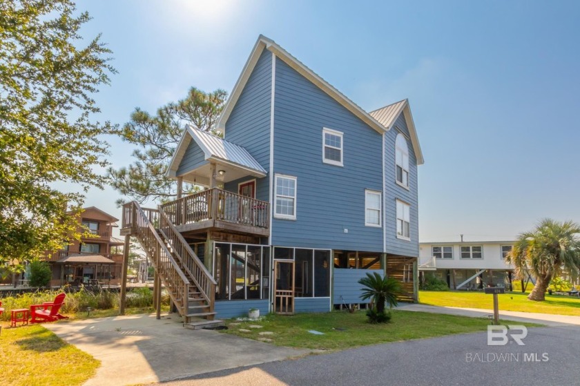 Beautiful Canal Front Property! This two bedroom, one and half - Beach Home for sale in Gulf Shores, Alabama on Beachhouse.com