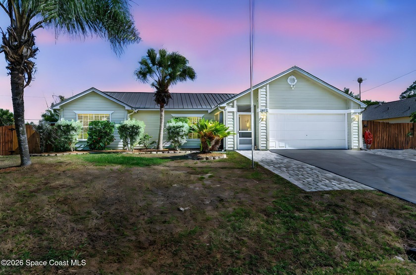 This beautiful home features an amazing outdoor oasis with a - Beach Home for sale in Palm Bay, Florida on Beachhouse.com