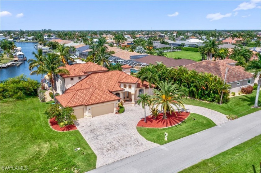 NEW stone coated metal roof!!! Discover SWFL living in this - Beach Home for sale in Cape Coral, Florida on Beachhouse.com