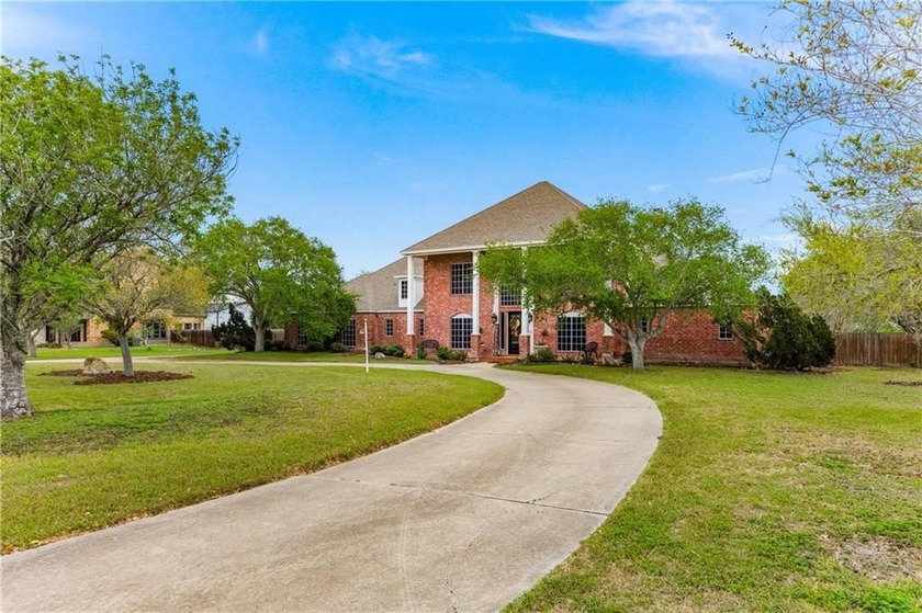 Discover an EXQUISITE COUNTRY RETREAT on just over an acre in - Beach Home for sale in Corpus Christi, Texas on Beachhouse.com