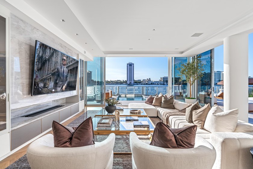 Floor-to-ceiling glass captures unobstructed lakefront views of - Beach Condo for sale in Boca Raton, Florida on Beachhouse.com