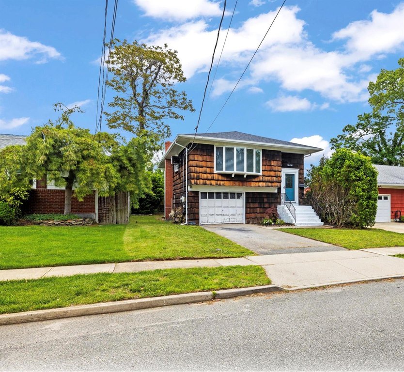 Welcome to this stunning, renovated Hi-Ranch in the heart of - Beach Home for sale in Massapequa, New York on Beachhouse.com