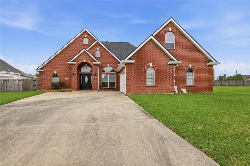 This stunning home offers 3 bedroom, 2 full baths, and 2 half - Beach Lot for sale in Port Arthur, Texas on Beachhouse.com