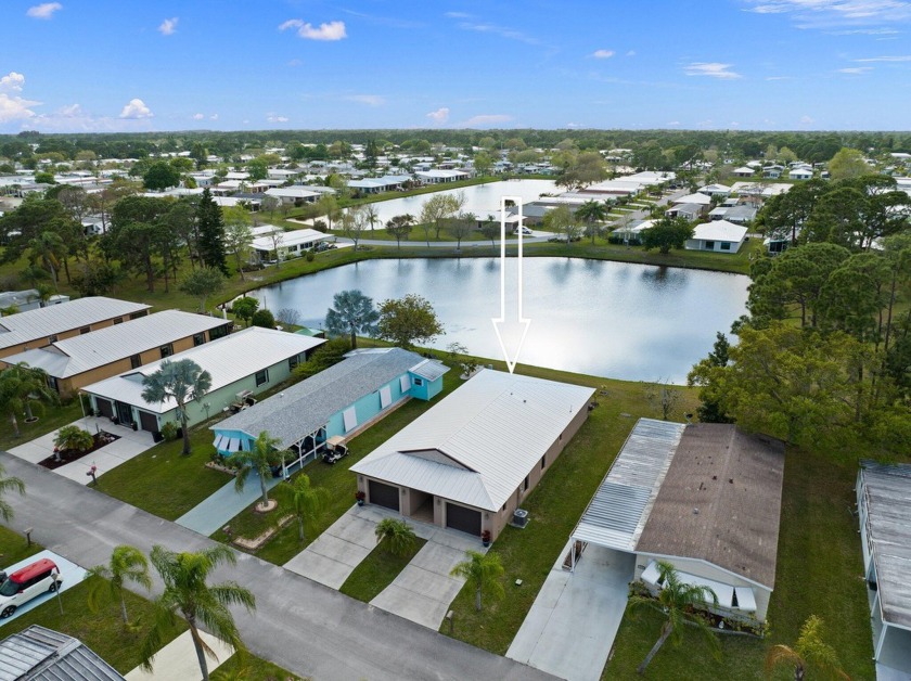 Welcome to your lakeside retreat! This stunning 3-bedroom - Beach Home for sale in Fort Pierce, Florida on Beachhouse.com