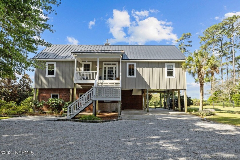 Welcome to your dream home!  This breathtaking residence is - Beach Home for sale in Beaufort, North Carolina on Beachhouse.com