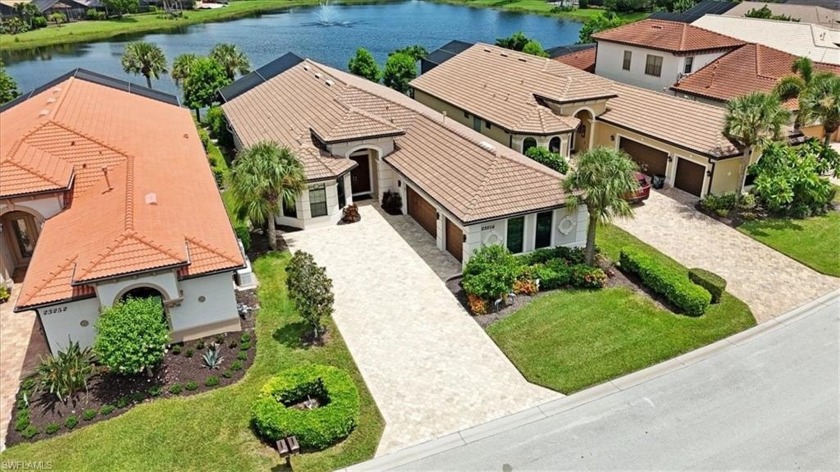 Experience the pinnacle of lakefront living within this elegant - Beach Home for sale in Bonita Springs, Florida on Beachhouse.com