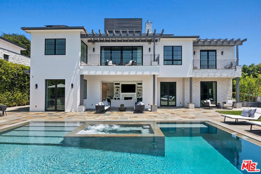 This meticulously crafted estate is located in the highly - Beach Home for sale in Pacific Palisades, California on Beachhouse.com