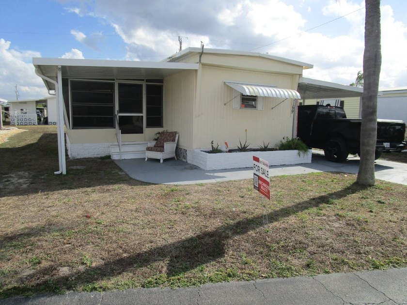 This charming 2-bedroom, 1-bath home is being offered Turnkey - Beach Home for sale in North Fort Myers, Florida on Beachhouse.com