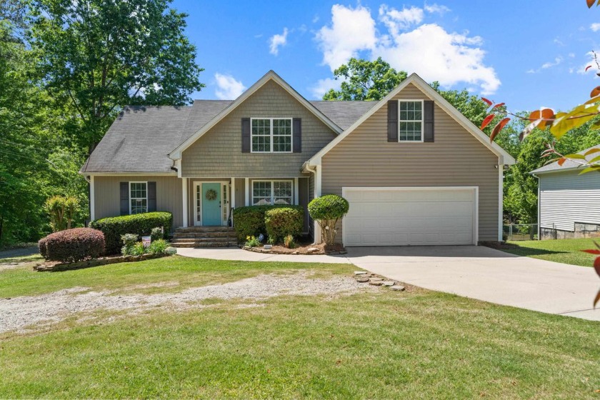 THIS LAKEFRONT RETREAT IS SURE TO BE A CROWD PLEASER WITH THE - Beach Home for sale in Eatonton, Georgia on Beachhouse.com