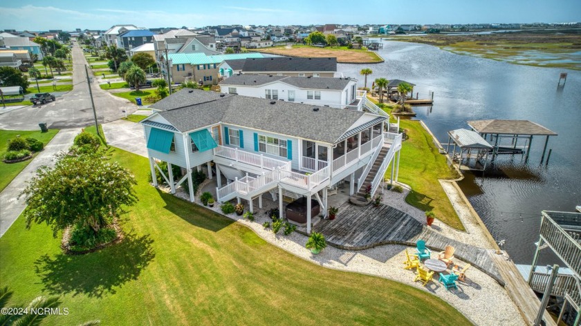 Experience the pinnacle of waterfront living in this stunning - Beach Home for sale in Surf City, North Carolina on Beachhouse.com