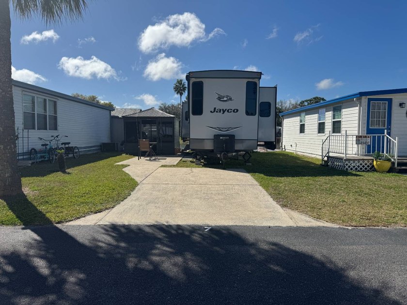 COME WINTER IN FLORIDA OR TAKE IT WITH YOU! This BEAUTIFUL - Beach Home for sale in Port Richey, Florida on Beachhouse.com