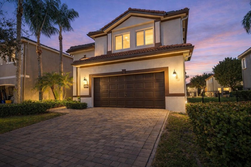 Welcome to refined Florida living in the highly sought-after - Beach Home for sale in Riviera Beach, Florida on Beachhouse.com