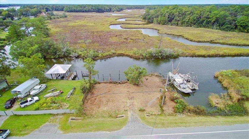 Discover your dream waterfront property just north of the Dog - Beach Lot for sale in Mobile, Alabama on Beachhouse.com