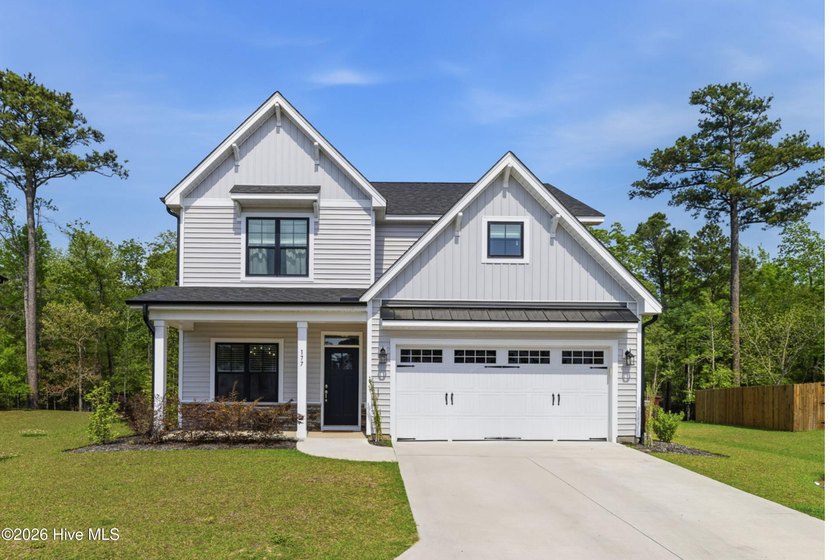 Welcome to refined coastal living in the sought-after Sanctuary - Beach Home for sale in Hampstead, North Carolina on Beachhouse.com
