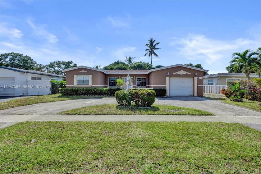 Welcome to this Lauderdale Lakes single-family home offering the - Beach Home for sale in Lauderdale Lakes, Florida on Beachhouse.com