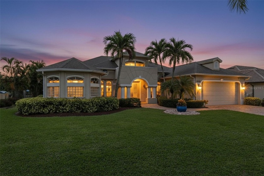 Welcome to 2106 SW 52nd Street, a custom-built Tuscan-inspired - Beach Home for sale in Cape Coral, Florida on Beachhouse.com