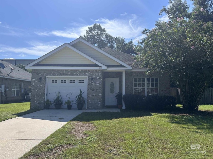 This beautifully updated home features fresh paint, new flooring - Beach Home for sale in Gulf Shores, Alabama on Beachhouse.com