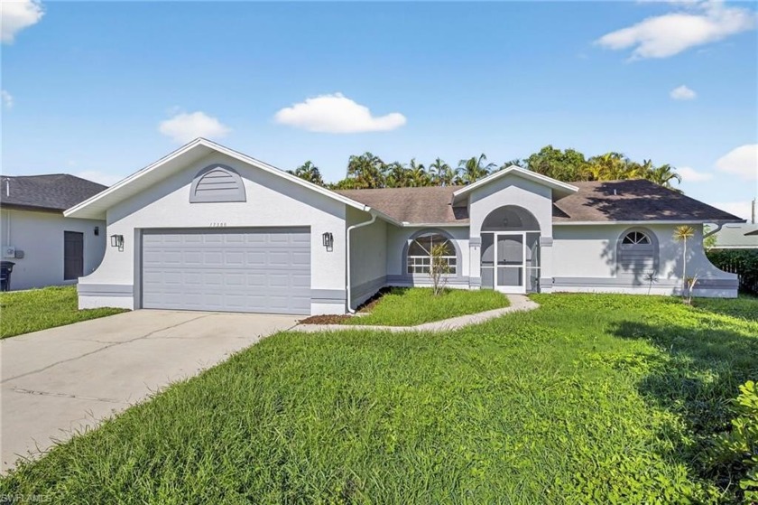 Welcome to this enchanting home tucked away in San Carlos Park - Beach Home for sale in Fort Myers, Florida on Beachhouse.com