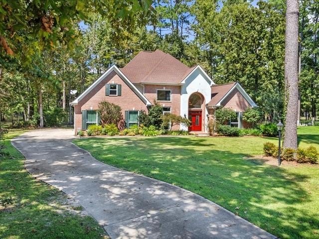 Gorgeous 1/2 Acre setting situated on a cul-de-sac, 44 acre lake - Beach Home for sale in Mandeville, Louisiana on Beachhouse.com