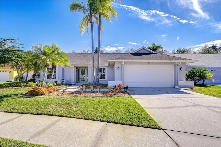 Set on a serene conservation lot, this beautifully maintained - Beach Home for sale in Tampa, Florida on Beachhouse.com