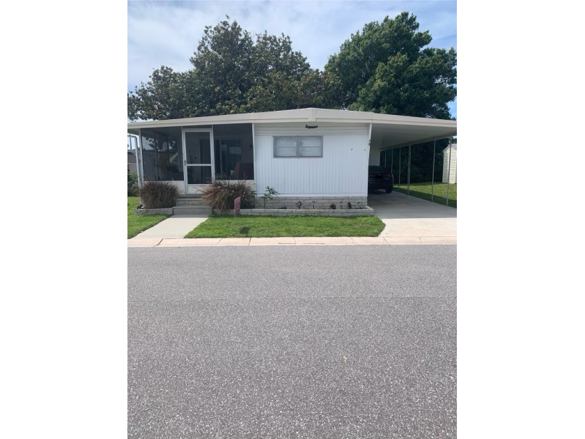 This beautiful 2 bedroom 1 and 1/2 bathroom double wide is fully - Beach Home for sale in Largo, Florida on Beachhouse.com