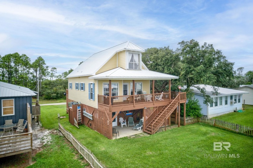 This waterfront property is a dream come true. Offering stunning - Beach Home for sale in Gulf Shores, Alabama on Beachhouse.com