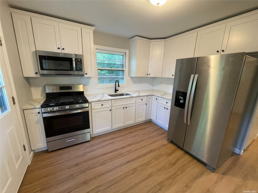 Beautifully renovated Cape Cod home situated in the charming - Beach Home for sale in Ridge, New York on Beachhouse.com