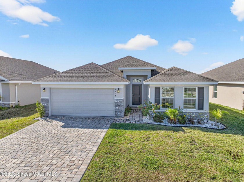 Experience modern lakefront living in the desirable gated - Beach Home for sale in Palm Bay, Florida on Beachhouse.com