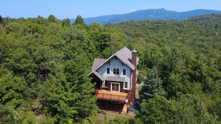 Perched on a private 2.5-acre lot in an upscale neighbourhood - Beach Home for sale in Mont-Tremblant,  on Beachhouse.com