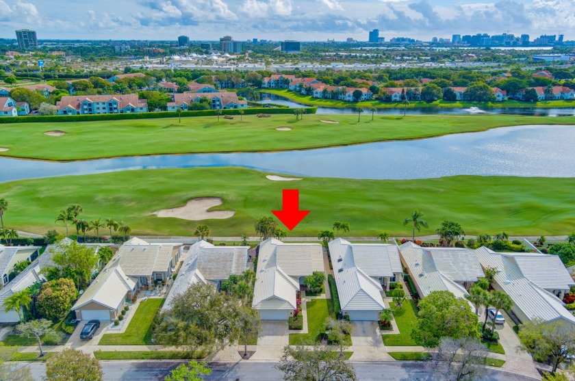 Coveted Bear Island location in features serene golf and lake - Beach Home for sale in West Palm Beach, Florida on Beachhouse.com