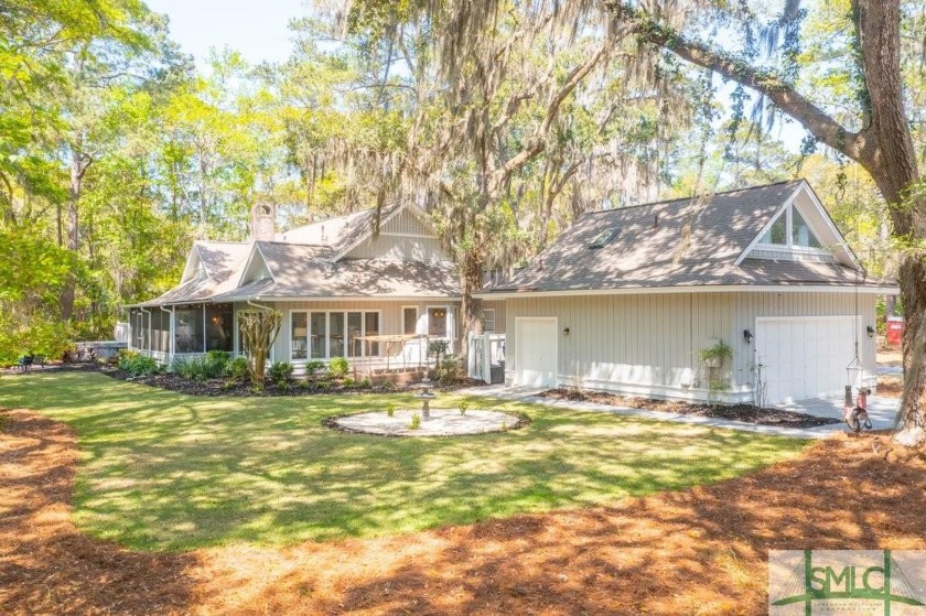 This gorgeously updated home at the Landings is located on an - Beach Home for sale in Savannah, Georgia on Beachhouse.com