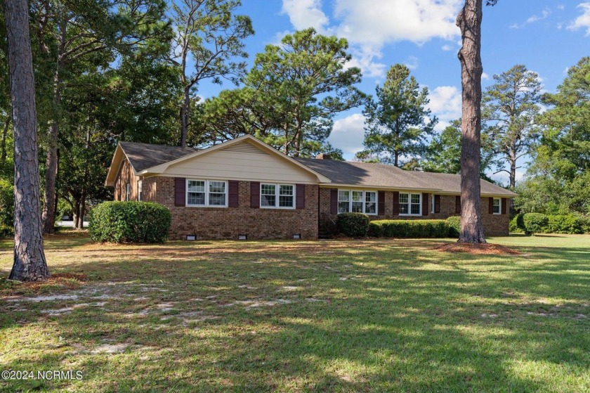 Nestled in the charming community of Carolina Beach, this - Beach Home for sale in Carolina Beach, North Carolina on Beachhouse.com