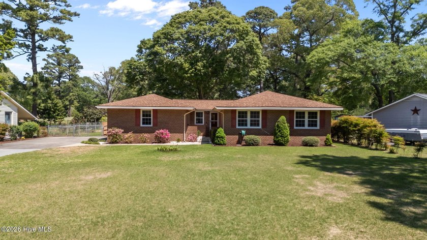 Welcome to this charming three-bedroom brick ranch nestled in - Beach Home for sale in New Bern, North Carolina on Beachhouse.com