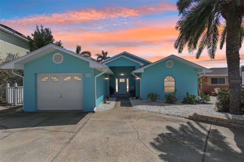 Enjoy waterfront living in this beautifully updated 2 bed, 2 - Beach Home for sale in Indian Rocks Beach, Florida on Beachhouse.com