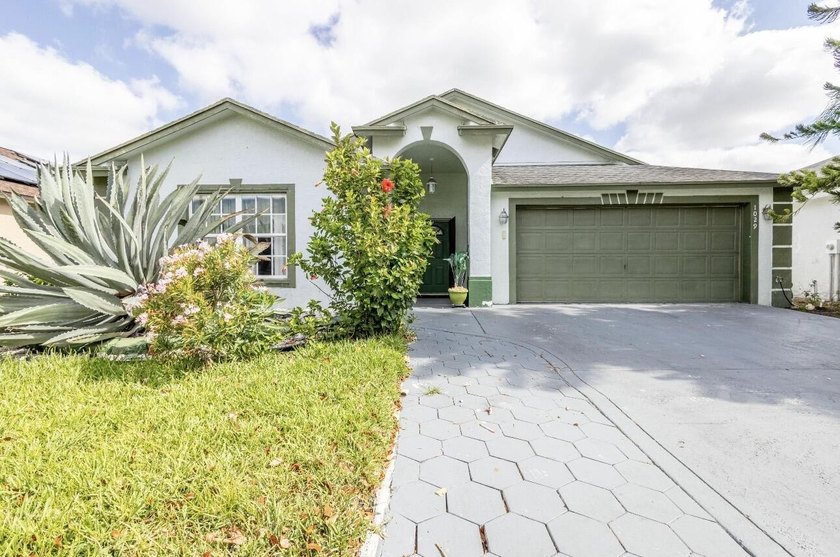 Get ready to call this beautiful single family 3 bedroom 2 bath - Beach Home for sale in Greenacres, Florida on Beachhouse.com
