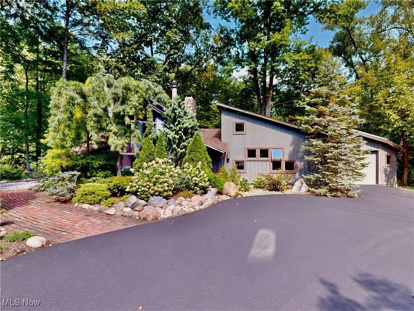 Modern Hillside Retreat Overlooking Big Creek Waterfalls Perched - Beach Home for sale in Painesville, Ohio on Beachhouse.com